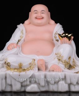 tượng phật di lặc trắng viền vàng ngự đá đẹp