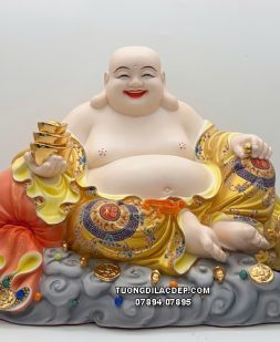 Tượng Phật Di Lặc ngự mây thỏi vàng tựa bao tiền hoa văn gấm vàng